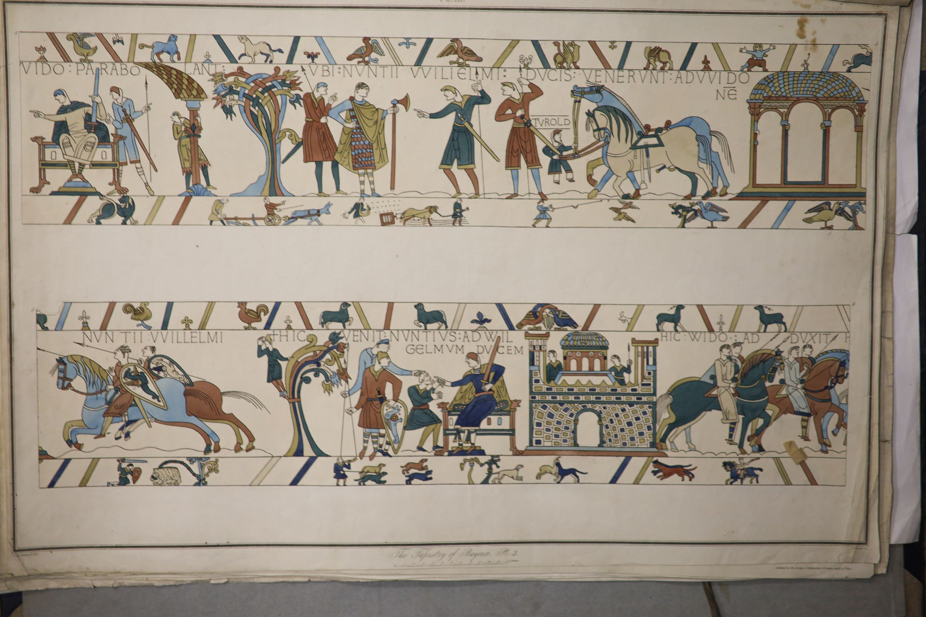 The Tapestry of Bayeaux, a portfolio of coloured lithographs after C. Stothard circa 1822, one plate incomplete 46x70cm